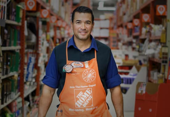 Home depot employee in the aisles of home depot